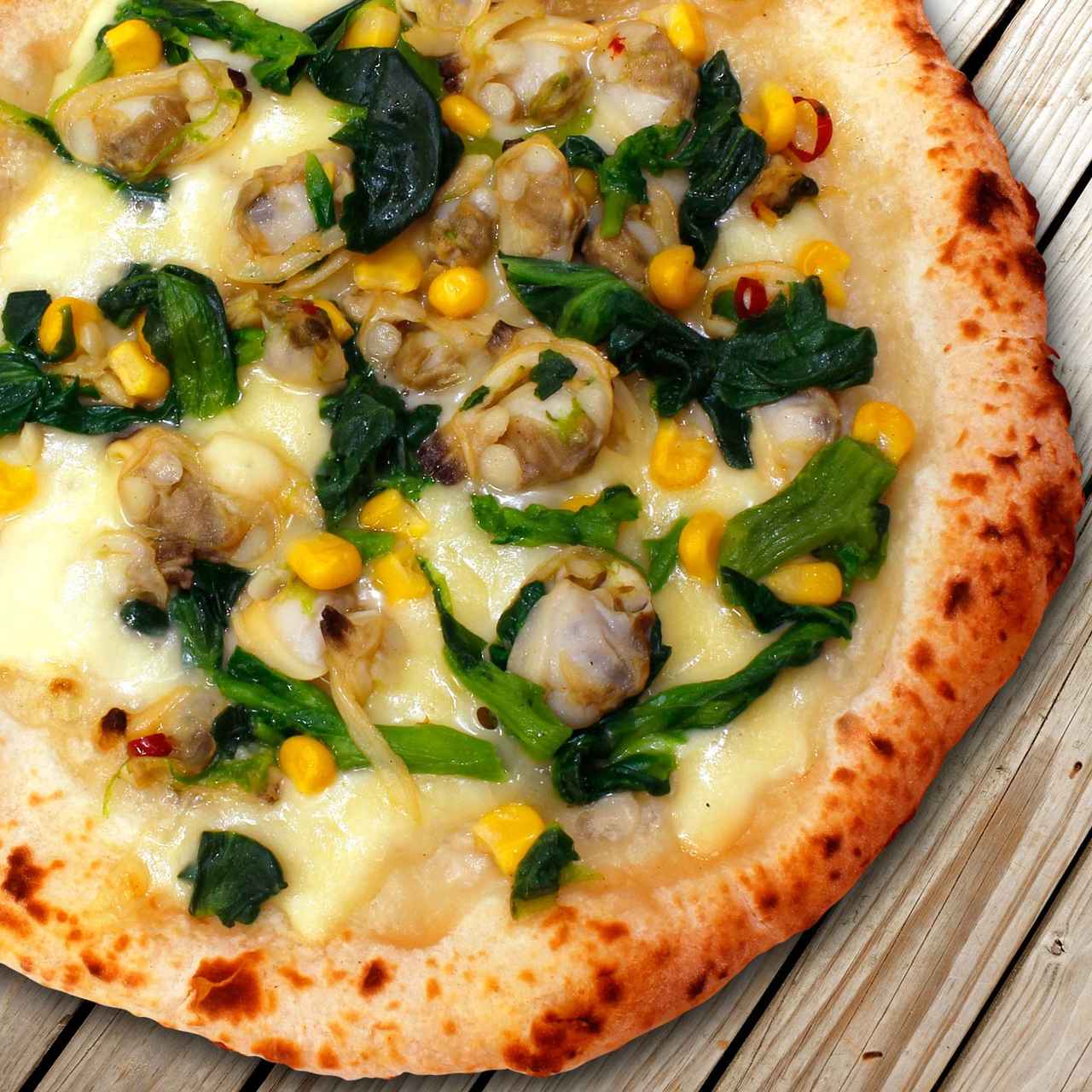 画像: 菜の花とアサリのピッツァ 春を感じる菜の花とアサリの相性は抜群です。