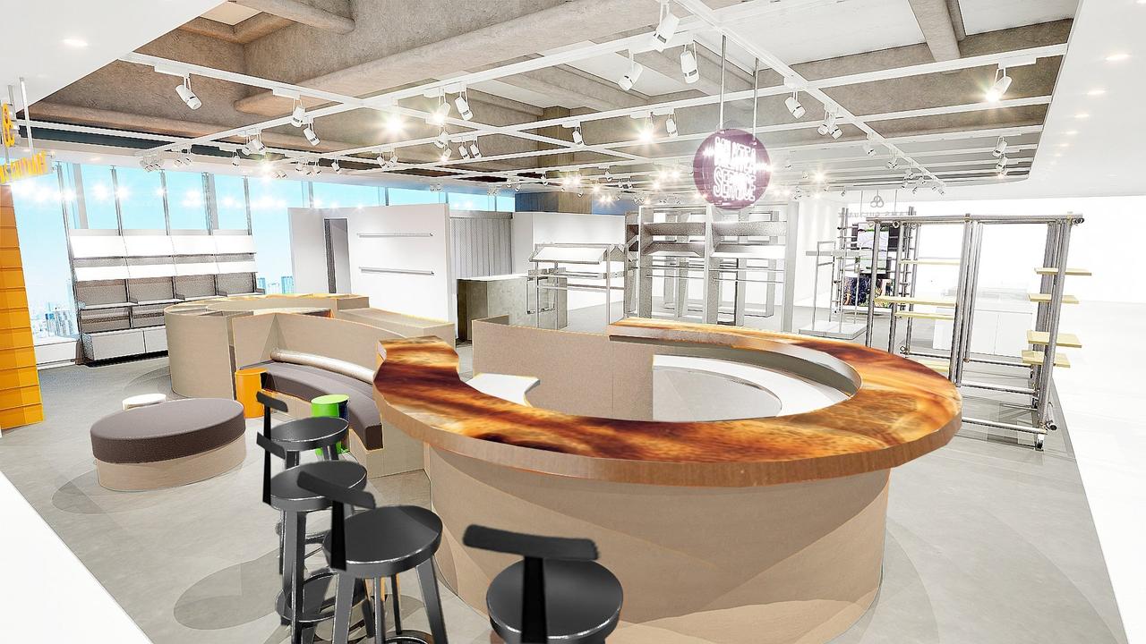 画像: 店舗入口ではMILK TEA SERVICEのミルクティーを提供、カウンター席で飲むことができる。兄弟アーティストユニットUMIMAE BROTHERSがミルクティーを描いたマーブル模様の円形のカウンターが目を引く。