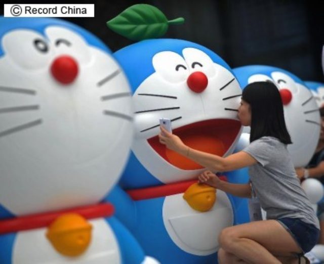 画像: 写真は14年、成都の「ドラえもんの秘密道具展示会」。 http://www.recordchina.co.jp/a110388.html