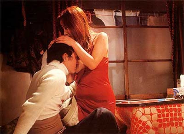画像: 赫い髪の女 http://maggot.pussycat.jp/revue/r011230.html