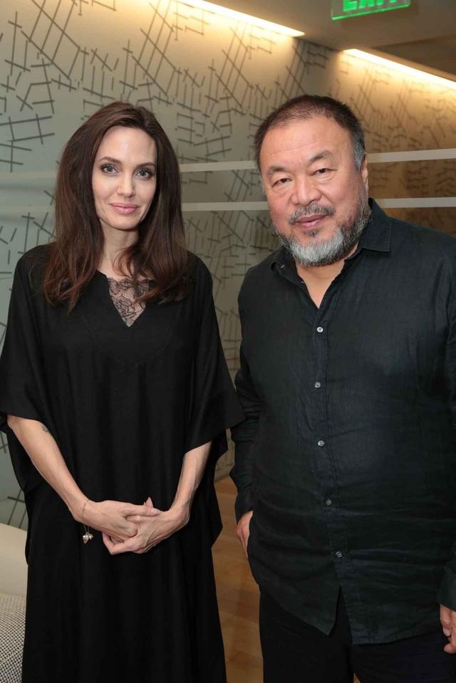 画像: Ai Weiwei with Angelina Jolie at the special screening of HUMAN FLOW