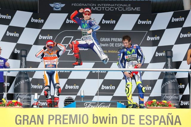 画像: 表彰台の御三方。飛びます、飛びます、ロレンソです? photos.motogp.com