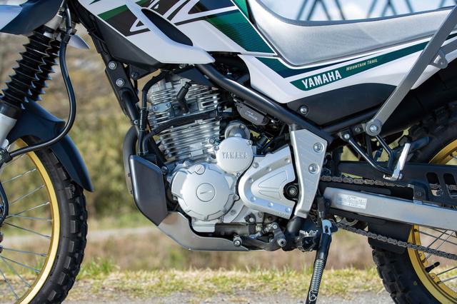 画像: タフで信頼性の高い空冷SOHC2バルブ単気筒。キャニスターの装着等により第3次排出ガス規制に対応し、燃費の向上も実現している。