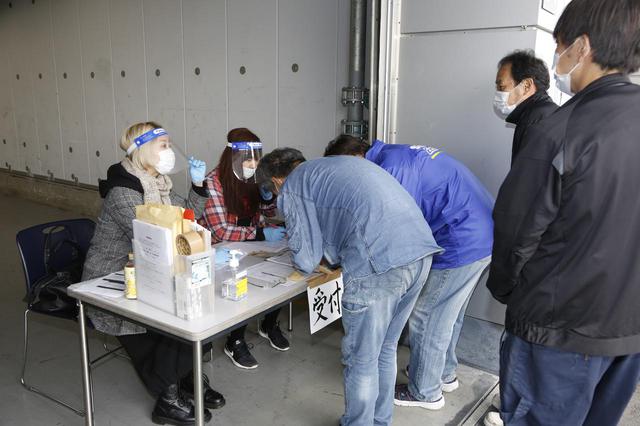 画像: 受付開始は8:30ごろから、33-34番ピット前の屋外にて行います