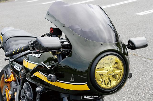 画像: カフェレーサーカウルはアメリカンドリーム製で、車両入手当時はまだZ900RS用ステー('20年末にキット化された)がなかったこともあって、0024ワークスでステーをオリジナル製作。ハリケーン・セパレートハンドルに合わせてカウル装着位置を低くしているのが大きな特徴となる。同じように低くマウントされたミラーはカーボンモノコックボディのマジカルレーシング・NK-1でタイプ3ヘッド。