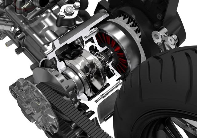 画像: ユニットスイング式の4ストローク単気筒124ccエンジンの、クランクシャフト右側につくACGスターター兼アシストモーター。ACGにアシストさせることで、従来のICEV並みにコンパクトな機関寸法を具現化しています。 www.honda.co.jp