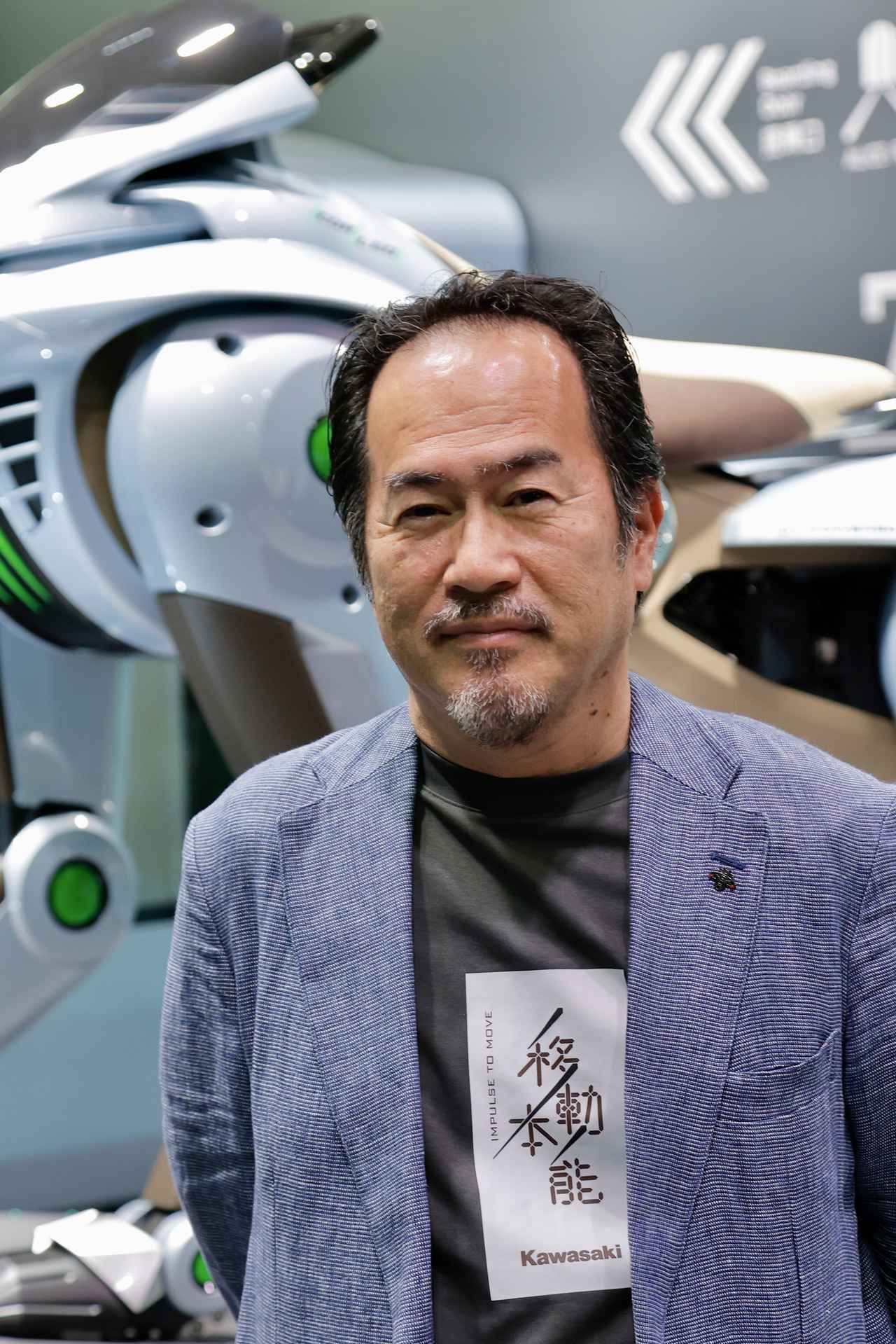 画像: 福本圭志氏 元川崎重工業モーターサイクル&エンジンカンパニー技術本部デザイン部長。「大阪・関西万博」で川崎重工グループが出展したコンセプトモデルの「CORLEO」のデザイン担当でもあり、今回は『H2Rのつくり方』を講演。