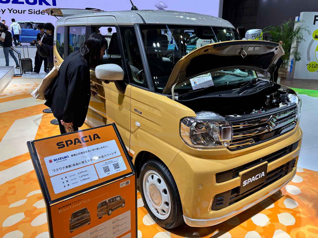 画像1: ▲同社がラインナップする軽自動車・スペーシアのトランクルームには、こっそり「e-PO」が積載されていた。