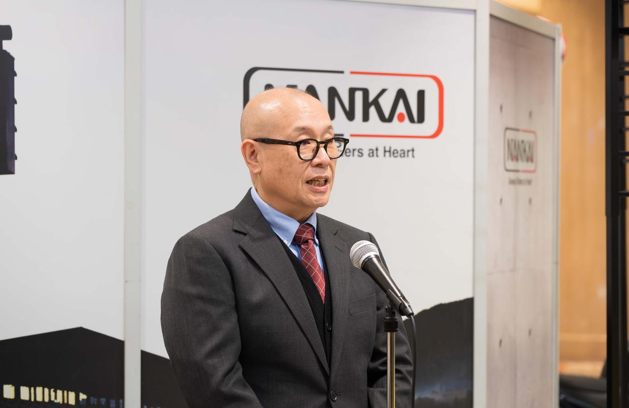 画像: 冒頭のあいさつをする南海部品株式会社の中嶋延行副社長。モータースポーツ文化の発展と次世代育成への強い想いを語った。