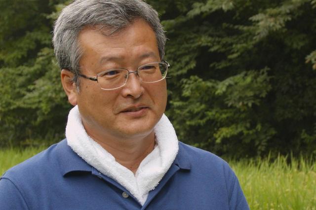画像: 日立製作所 環境推進本部 本部長 ITエコ実験村 村長 出居昭男