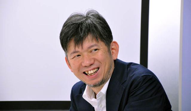 画像: IoTビジネス開発統括部長 山平 哲也。IoTを中心としたエコシステム構築とビジネス創造を推進中。趣味は、旅にでることと居酒屋めぐり。それに、ハルキスト。