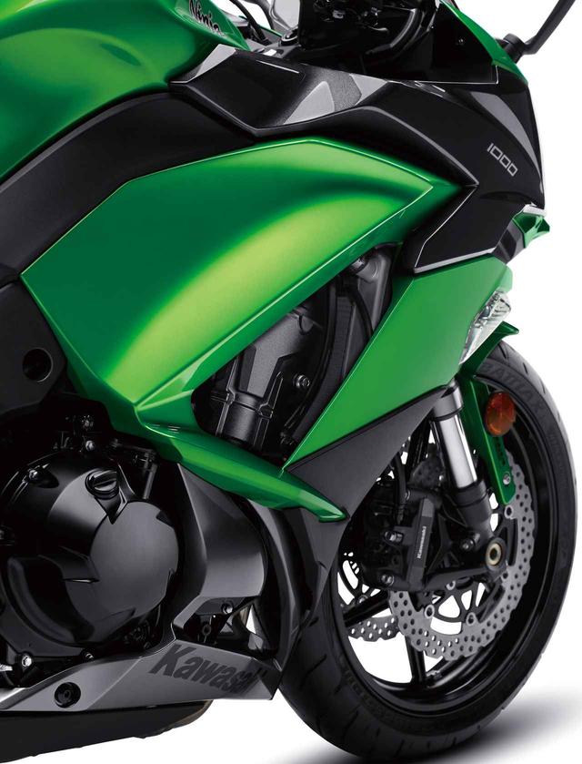 画像: Two pieces fairing is lifted 28mm for better protection against wind www.autoby.jp