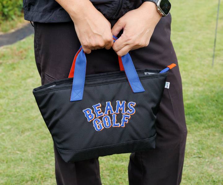 画像: 表がブルーで裏がレッドの持ち手がアクセントのカートバッグ