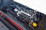 画像: 1L直3自然吸気エンジンをリアに搭載して後輪を駆動する。JC08モード燃費は21.9km/Lとなる。