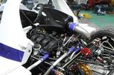 画像: フォード製の2L直4DOHCターボエンジンに6速ドグミッションを組み合わせる。