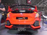 画像: ホンダブースではオレンジ色の1台も展示されていた。マフラー出口が特徴的。