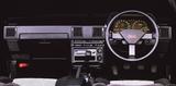 画像: ステアリングのセンターパッドには「TWINCAM turbo」の文字が燦然と輝く。オプションでデジタルメーターも選択可能だった。