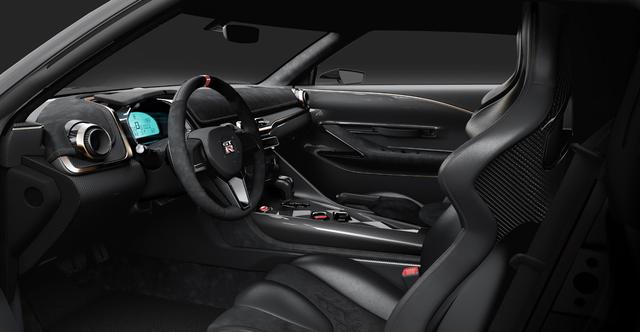 画像: ベース車のデザインを踏襲しながらも、メーターまわりなどを大胆にモデファイ。ステアリングもカーボン製に。