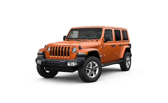 画像: 新型発売記念仕様として設定されるジープ ラングラー アンリミテッド ローンチエディション。通常ではオプション設定となるレザーシート、フロントシートヒーター、ヒーテッドステアリングホイール、革巻きシフトノブを標準装備する。
