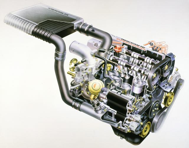 画像: MR2に搭載されたスーパーチャージャー付4A-GZE。エンジンをリアに積むため、インタークーラーをエンジン横に配置した。