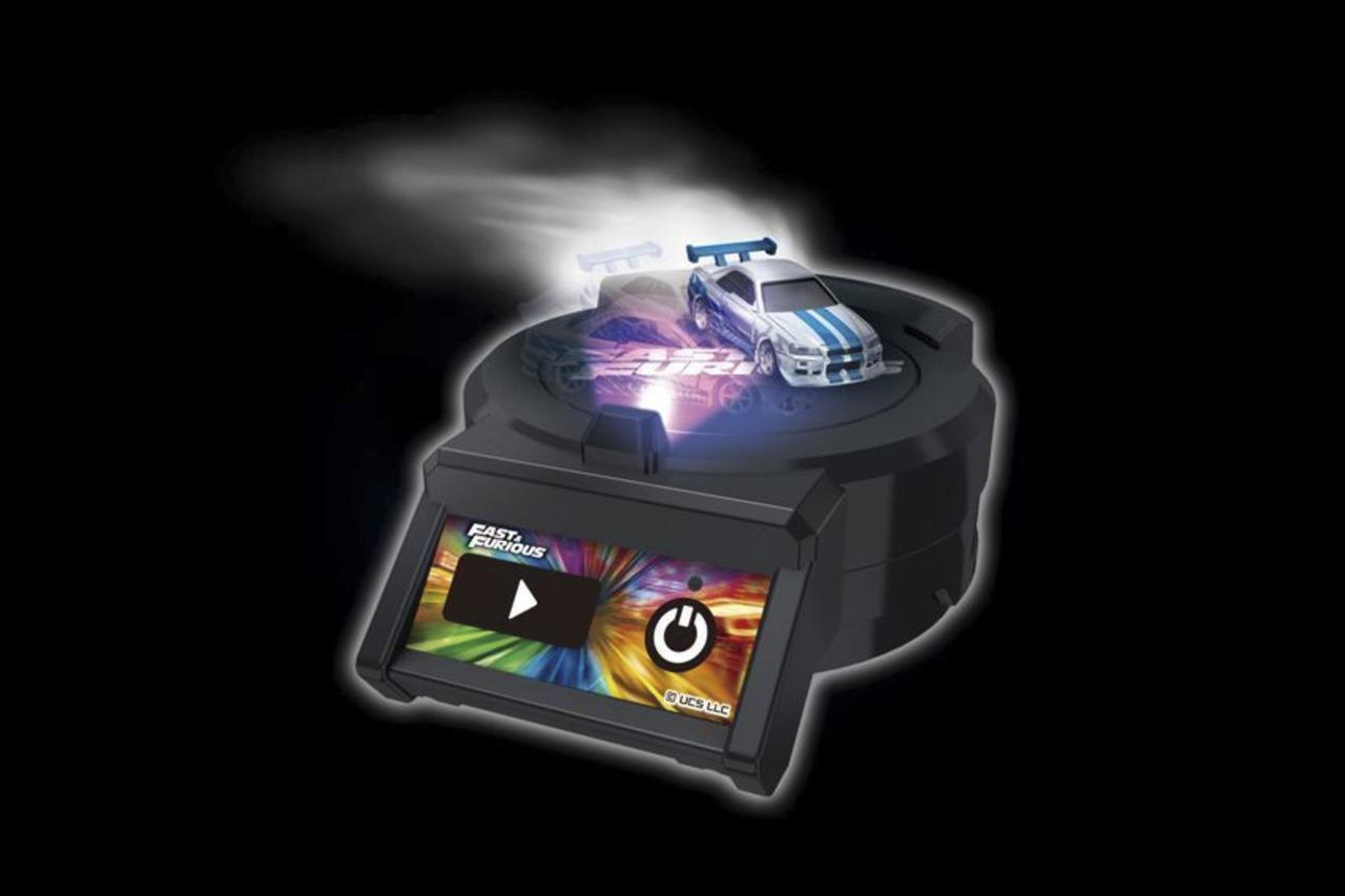 画像: 「tomica+」シリーズ第2弾の「トミカプレミアムunlimited DRIFT TURN STAGE」。ボタンを押すと白煙、スキール音、LED照明やBGMと共にトミカがドリフトする姿を楽しむ事ができる。(写真は『ワイルド・スピード』) © TOMY © Universal City Studios LLC. All Rights Reserved.