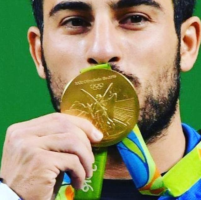 画像2: イラン出身オリンピック選手、祖国地震のために金メダルをオークションに