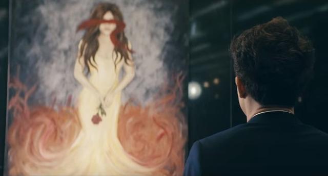 画像: 「ハウ・ロング」のMVに黒髪の女性の絵が登場する。