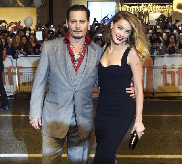 画像: アンバー・ハードがジョニー・デップに離婚示談金の倍額を請求!その理由とは?