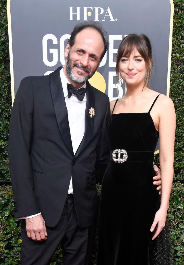 画像: ルカ・グァダニーノ監督と女優のダコタ・ジョンソン。