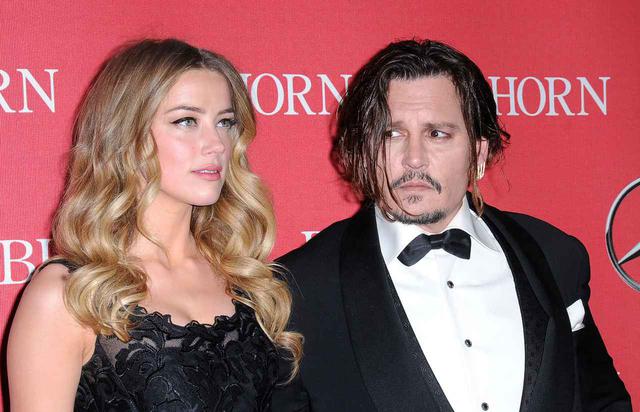 画像: ジョニー・デップ(右)と彼の元妻のアンバー・ハード(左)。