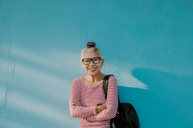 画像: 幸せそうに微笑むタイの女性。© 1261476589, Erdark, Getty Images