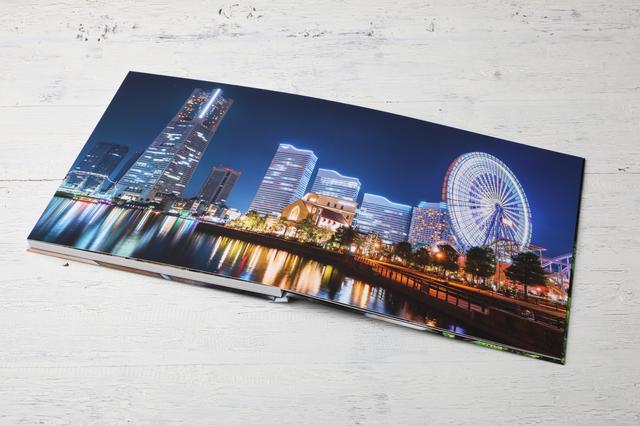 画像: 「レイフラット」で製本した見開きページ canon.jp
