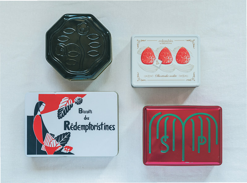 画像: 左上から時計まわりに「資生堂バーラー」銀座店限定の花椿ビスケットの黒缶、「コロンバン」ショートケーキクッキー缶、「資生堂パーラー」リーフパイ缶、「長崎レデンプトリスチン修道院」のクッキー缶