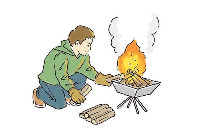 画像: 4 炎が安定したら、太い薪をくべる
