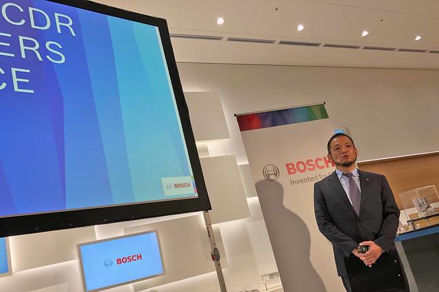 画像2: 写真は日本の状況を説明するBOSCH APS CDRプロジェクトマネージャーの里 廉太郎氏