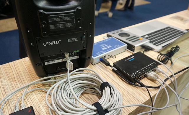 画像: ジェネレックのブースには、LANケーブル1本で電源と音声信号を伝送できるIPオーディオ・アクティブスピーカー「4430」も展示されていた。現在は設備用だが、再生機器が整えばサラウンド用などでも活躍しそうだ