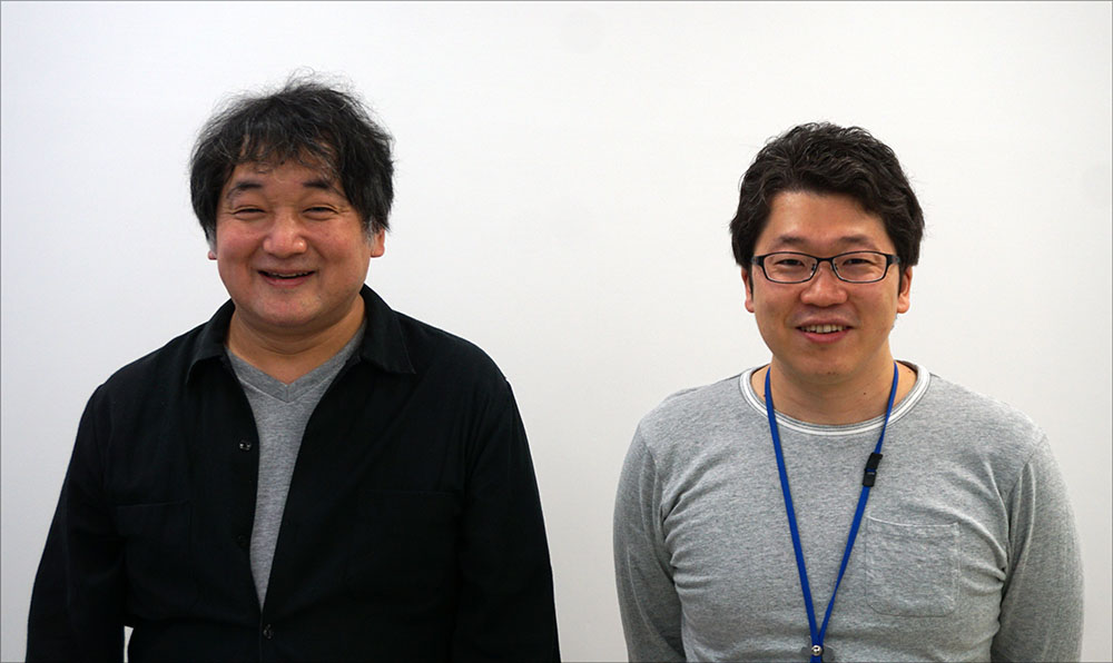 画像: インタビューにご協力いただいたおふたり。左は株式会社円谷プロダクション 製作本部 エグゼクティブマネージャー 兼 製作部 ゼネラルマネージャー 隠田雅浩さんで、右は同 製作本部 製作部 設定・監修チーム 池田 遼さん