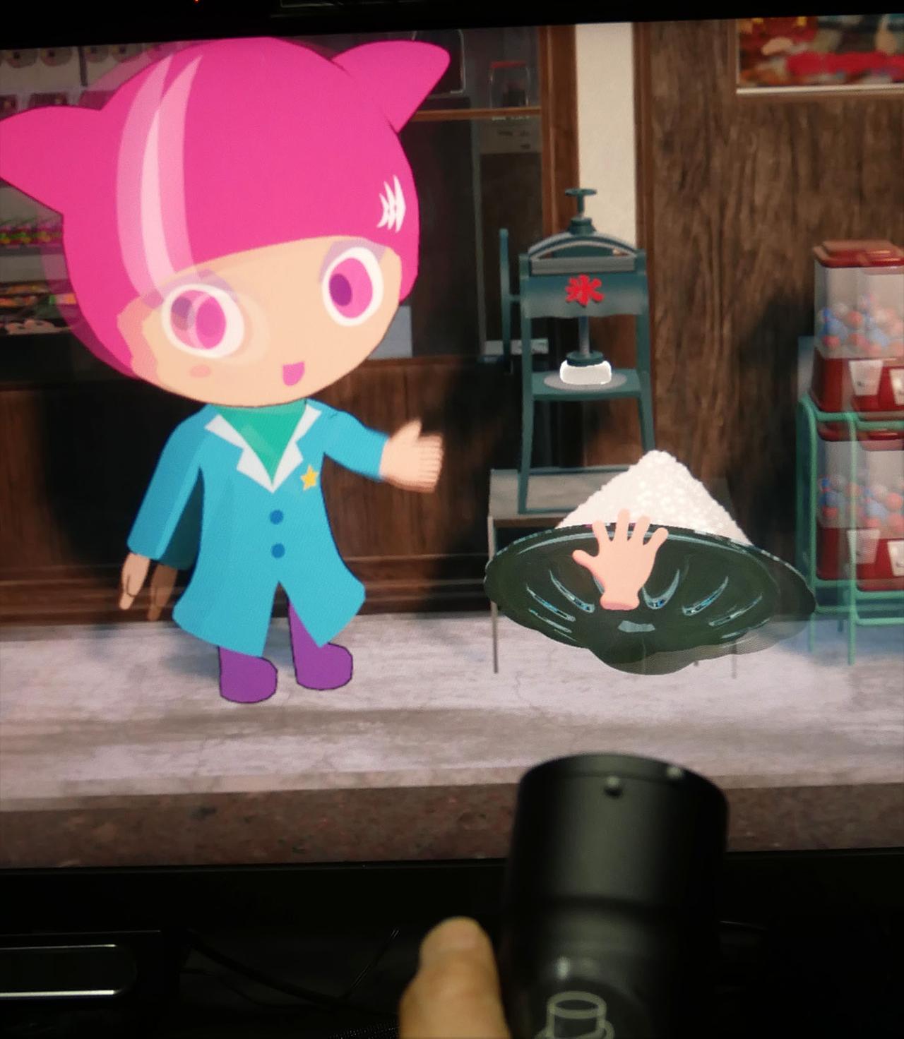 画像: 体感リモコンを画面に向けることでグラフィックの操作も可能