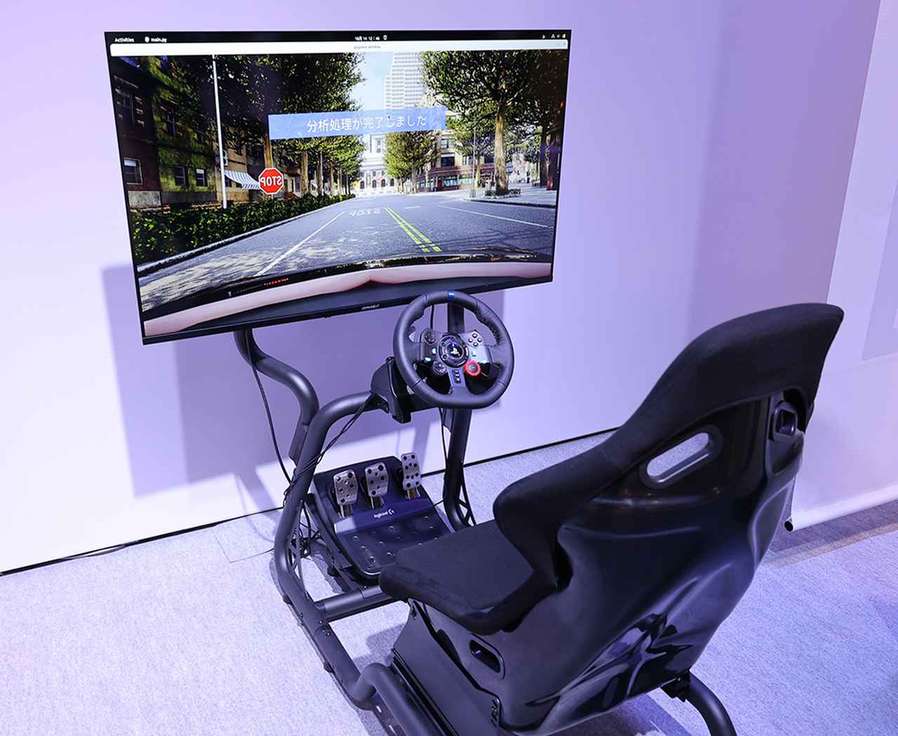 画像: 運転シミュレーターと、NECの持つ映像認識AI、大規模言語モデルを掛け合わせて、自身の運転をAIが分析、安全運転へのアドバイスをしてくれるもの