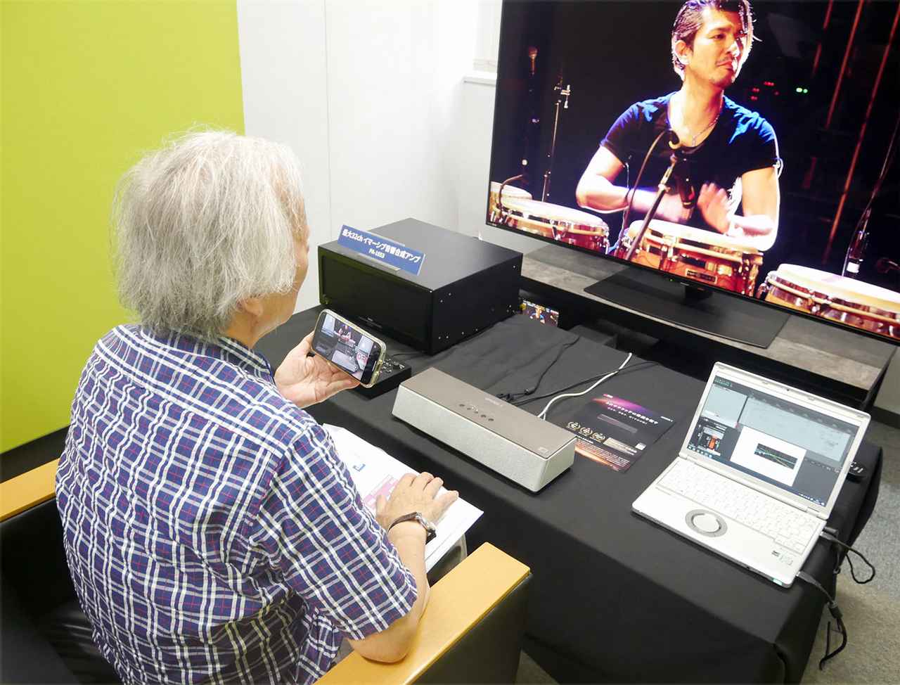 画像: 最大32チャンネルのサラウンド音声を、リアルタイムで任意のチャンネル数のサラウンド音声にエンコードできるサウンドプロセッサーも展示。会場では22.2ch音声を2chのバイノーラルサウンドに変換し、OPSODISのスピーカーで再生していた