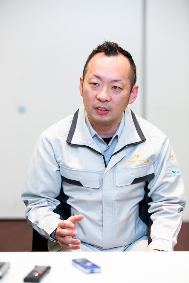 画像: ホール音響設備の選定・導入を担当した「ヨコセAVシステム」の吉澤友樹氏