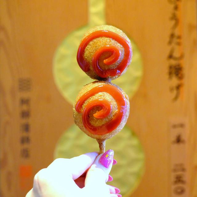画像: ぐるぐるっとしたフォルムもカワイイ。結構食べ応えもあります。夕方になると良く売れるそうで、おやつとしてだけではなく、日々親しまれているようです。