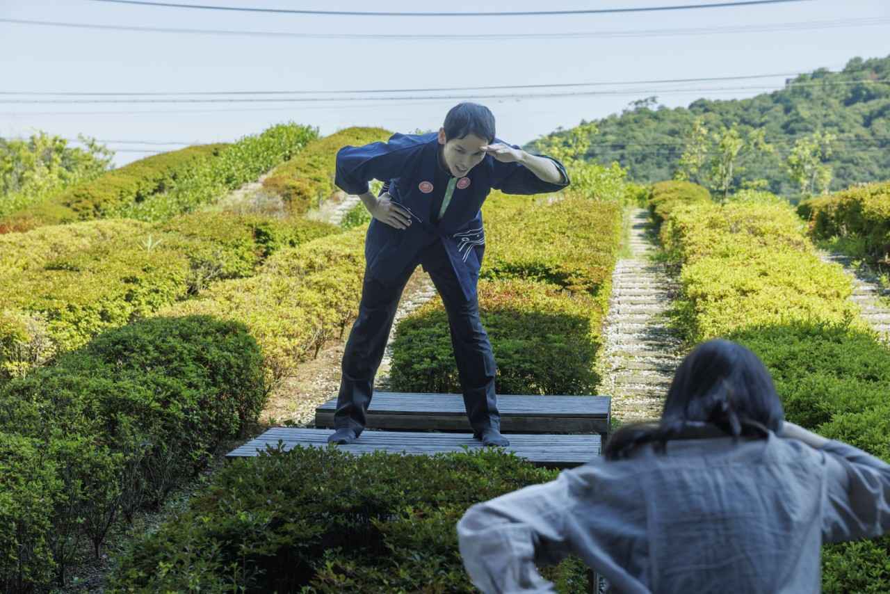 Image 1: Tea picking exercises to regulate the body and breath, followed by a breakfast of tea boxes filled with a refreshing aroma