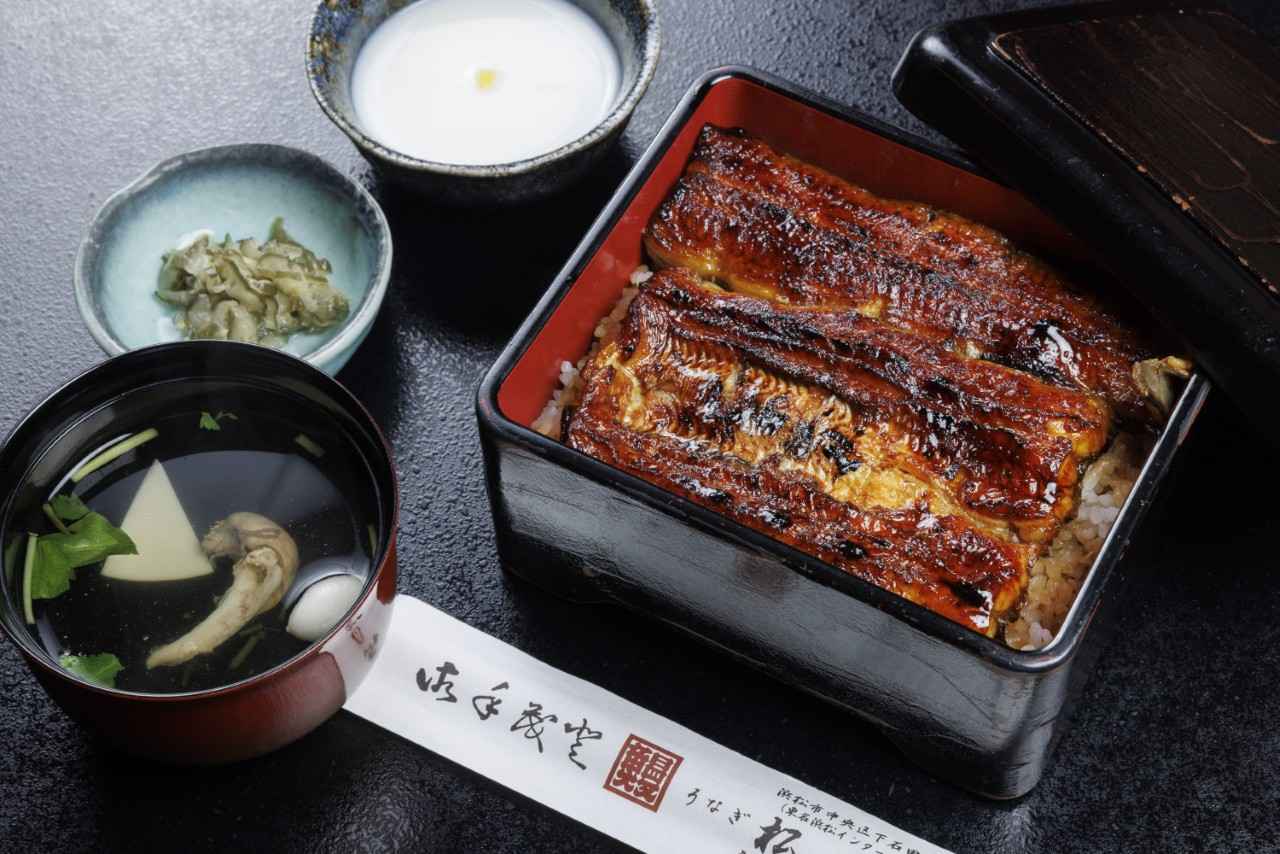 Image 2: Crisply grilled eel and translucent thin slices of eel. Two types of eel you'll encounter at Matsuba