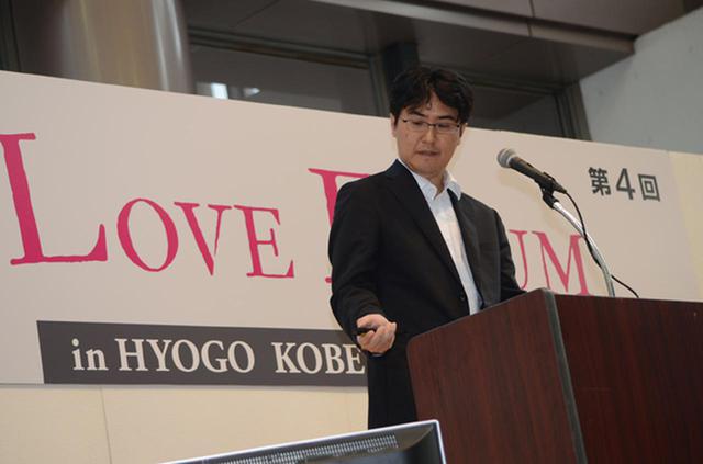 画像: ロードマップについて発表する経産省の高橋課長補佐
