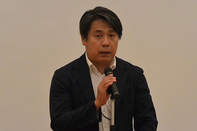 画像: 開会あいさつを行う経産省の河野課長