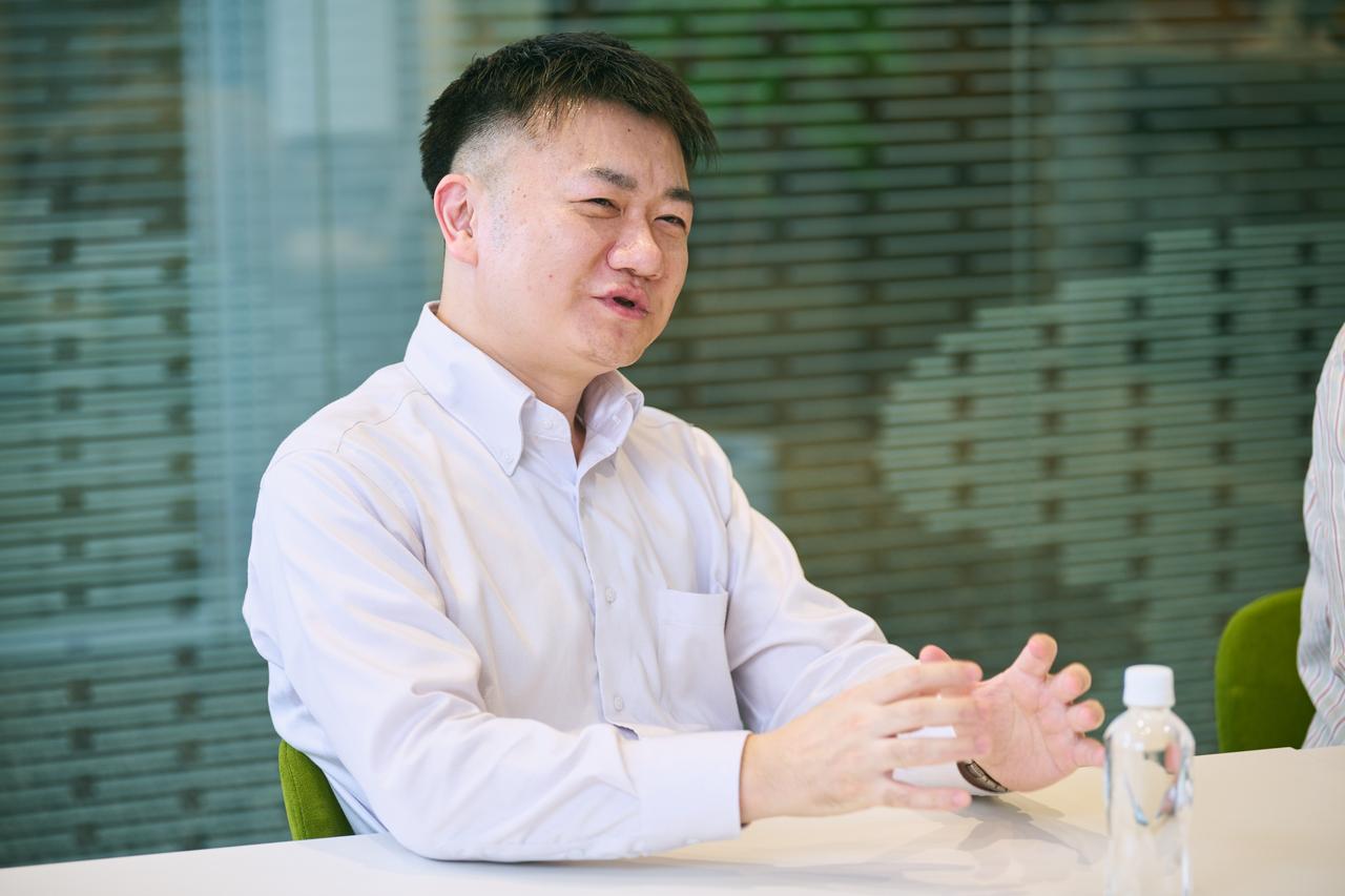 画像: 吉田美徳氏（日立製作所 AI＆ソフトウェアサービスビジネスユニット デジタル事業開発統括本部 Data＆Design Data Studio 技師）