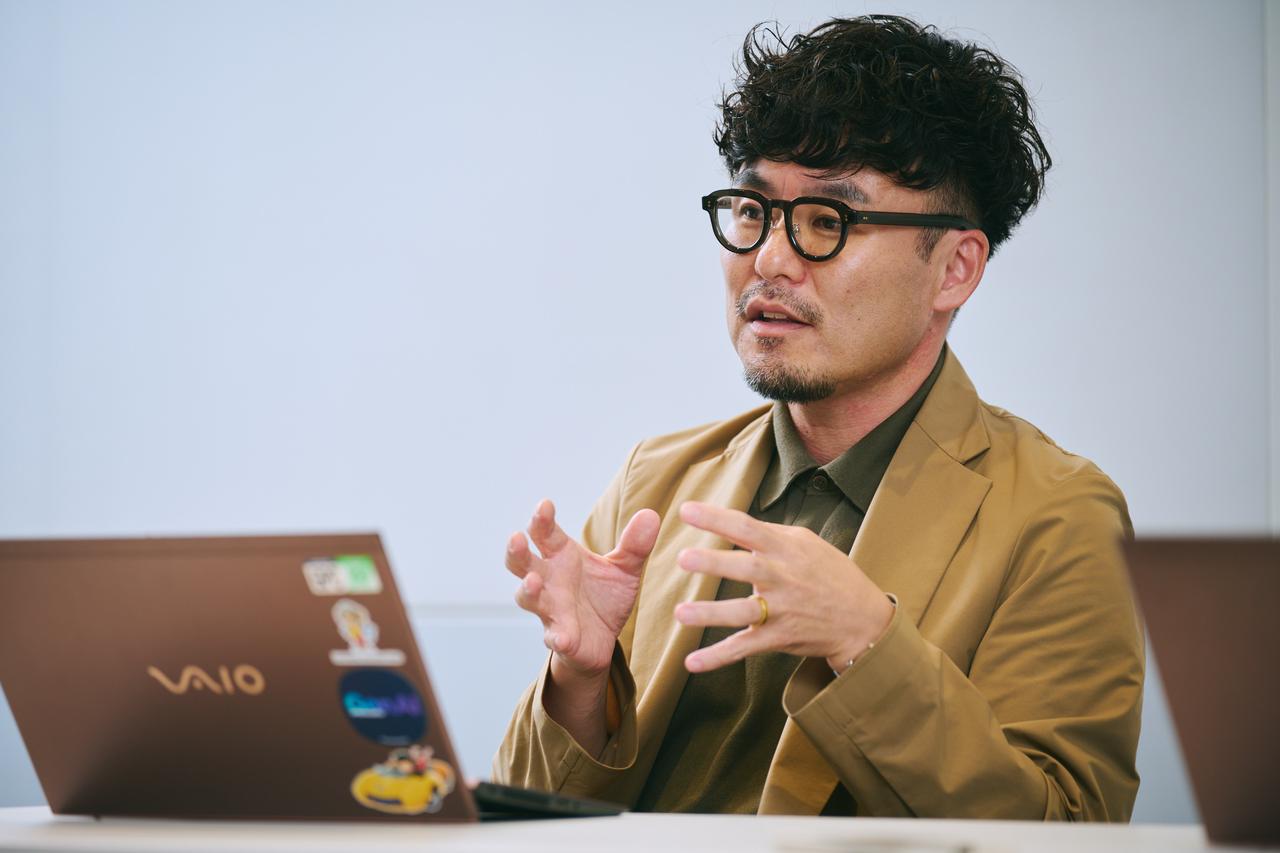 画像: 斎藤岳氏（日立製作所 AI＆ソフトウェアサービスビジネスユニット アプリケーションサービス事業部 LSH適用推進部 部長 兼 AICoE Asset&Scaling AIアセットアクセラレーション部長）