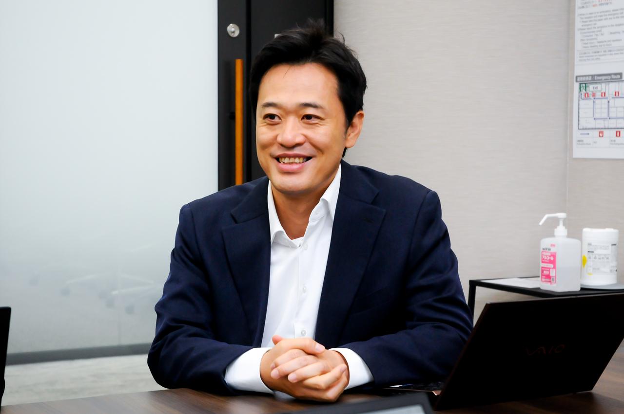 画像: 株式会社 日立製作所 インダストリアルAIビジネスユニット エンタープライズソリューション事業部 流通システム本部 第二システム部 チーフプロジェクトマネージャ 横沢 邦一