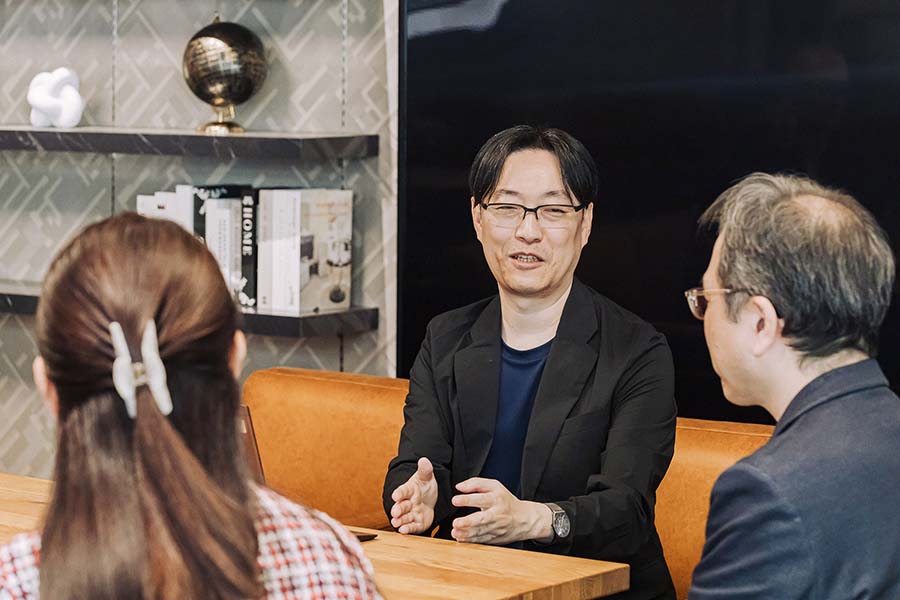 画像: MBAを取得した自身の経験を語る、システムイノベーションセンタ リーダ主任研究員の竹上